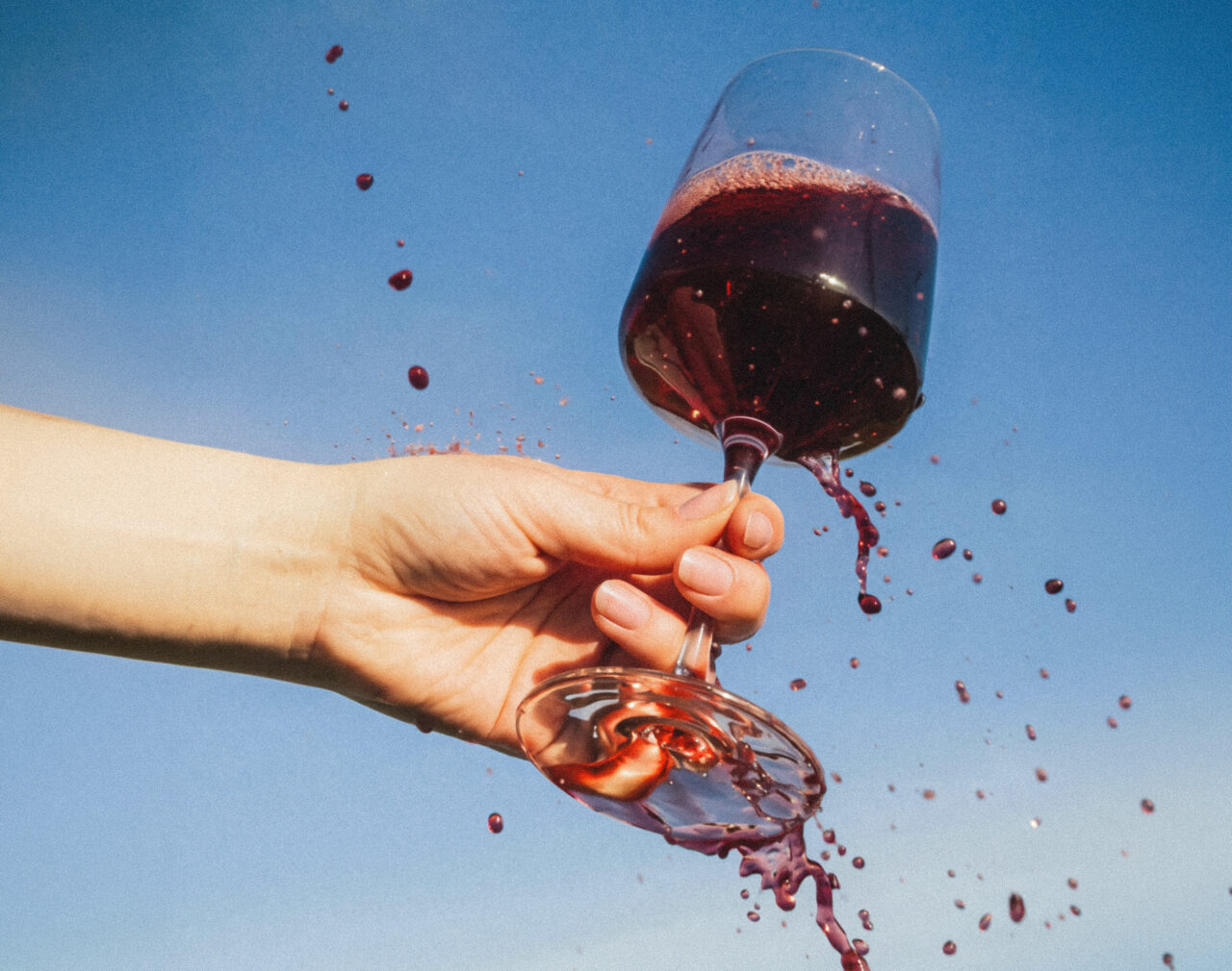 Splashing wine glass